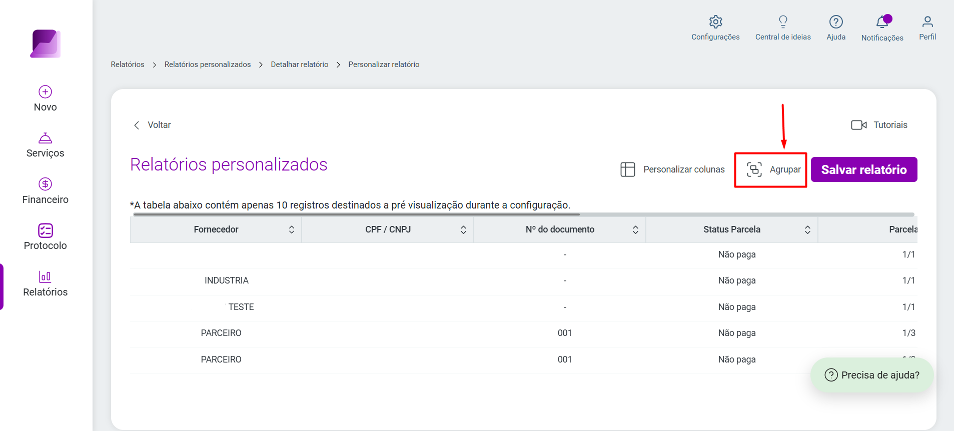 Tela de personalização de relatórios, apontando para o botão 'Agrupar', que permite organizar os dados por uma coluna específica.