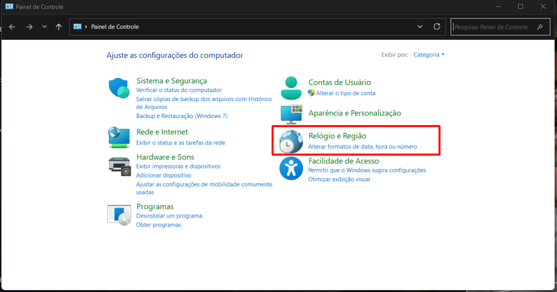 Painel de Controle do Windows com destaque na opção "Relógio e Região" para configurações de data, hora e números.