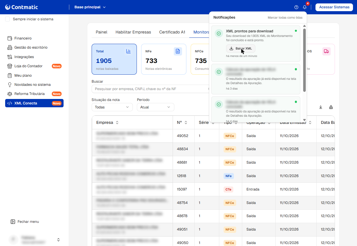 Notificação no sistema informando "XML prontos para download" com o botão "Baixar XML" em destaque.